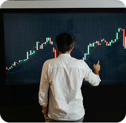 Person looking at financial charts